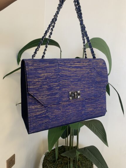 Blue and gold chain bag